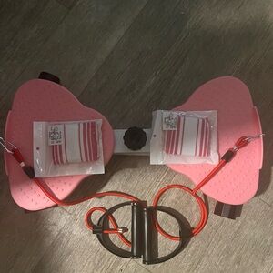 Pink Exercise Equipment with Red Bands